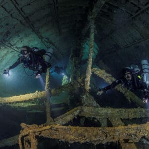 A group of scuba divers in the water.